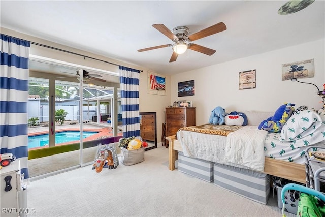 bedroom with ceiling fan, access to exterior, and carpet flooring