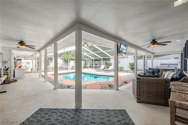 view of pool with ceiling fan