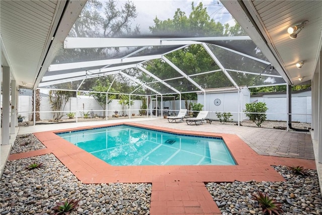 view of swimming pool featuring a patio area