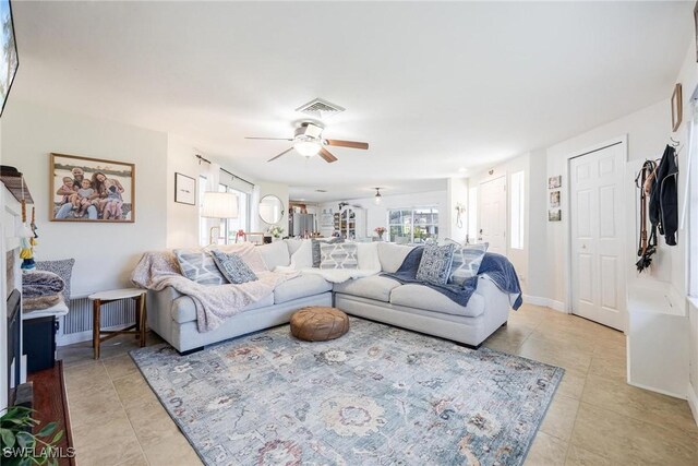 living room featuring ceiling fan