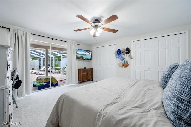 bedroom with ceiling fan, access to exterior, carpet, and multiple closets