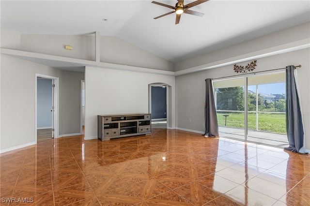 unfurnished living room with high vaulted ceiling, tile patterned floors, and ceiling fan