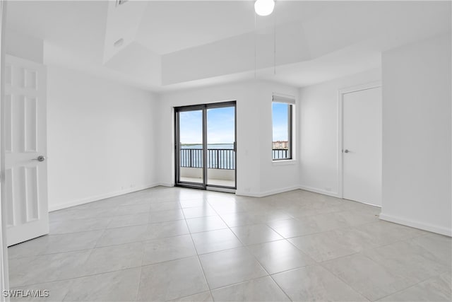 empty room with light tile patterned floors