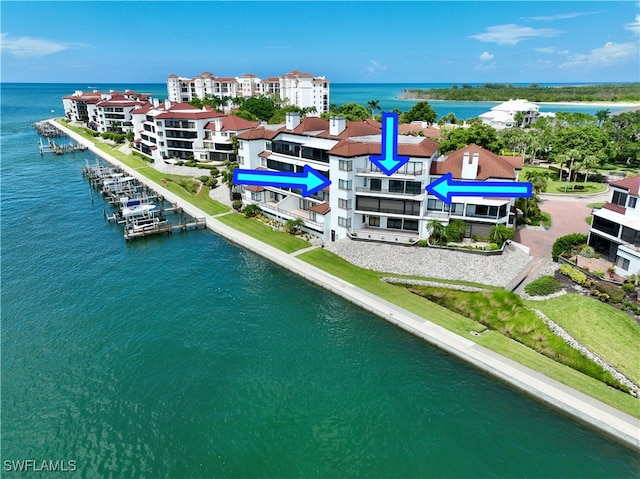 drone / aerial view with a water view