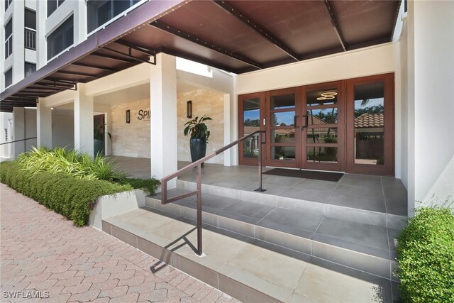 doorway to property featuring french doors