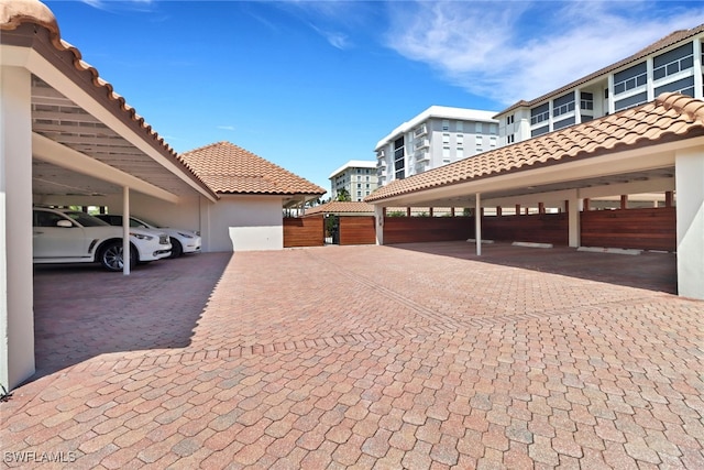 view of property exterior featuring a carport