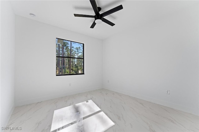 unfurnished room featuring ceiling fan