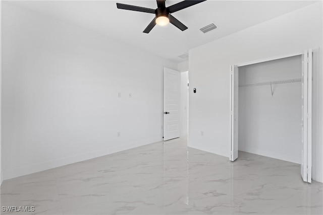 unfurnished bedroom featuring a closet and ceiling fan