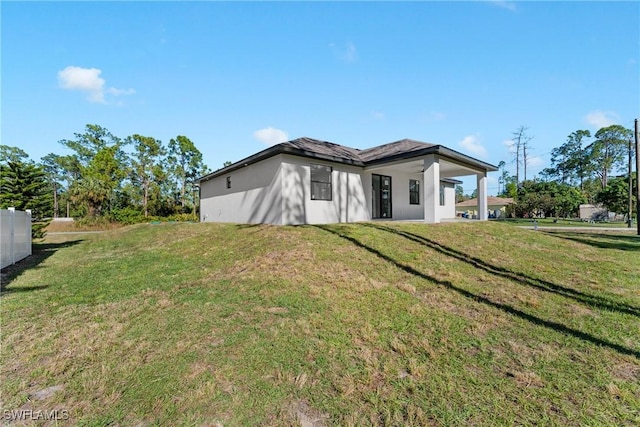 view of front of home with a front yard