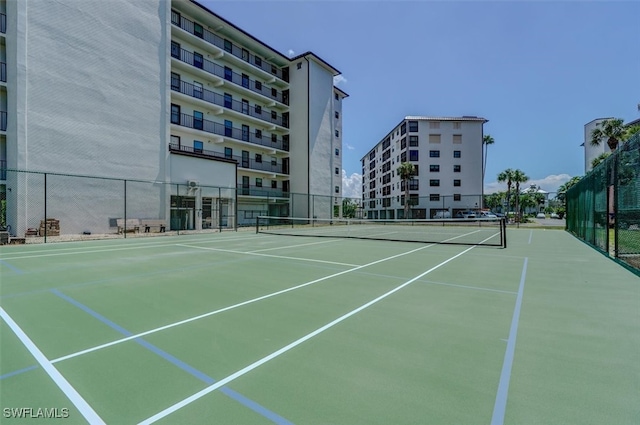 view of sport court featuring basketball hoop