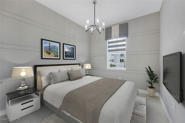 tiled bedroom with an inviting chandelier and baseboards