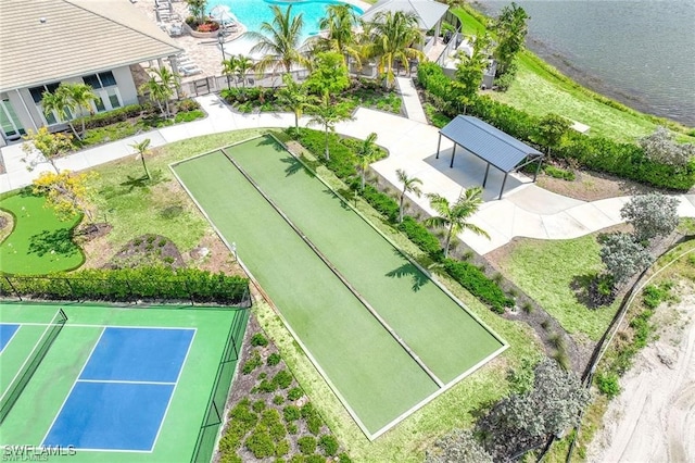 birds eye view of property with a water view