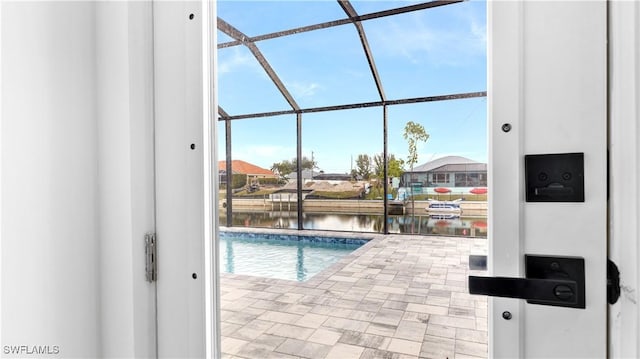 view of pool featuring a water view