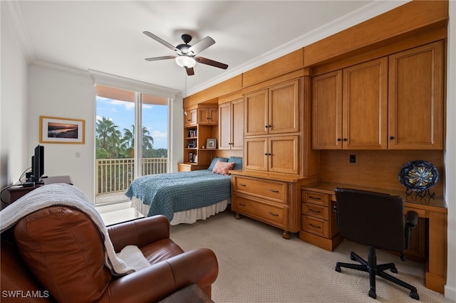 carpeted bedroom with access to outside, ceiling fan, and ornamental molding