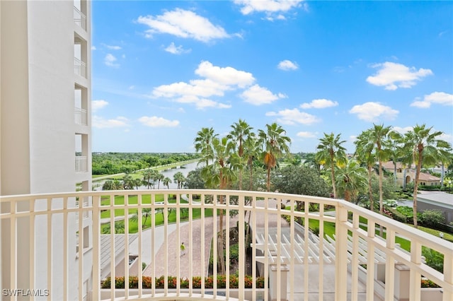 balcony featuring a water view