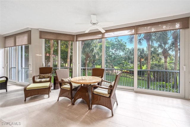 sunroom / solarium with ceiling fan