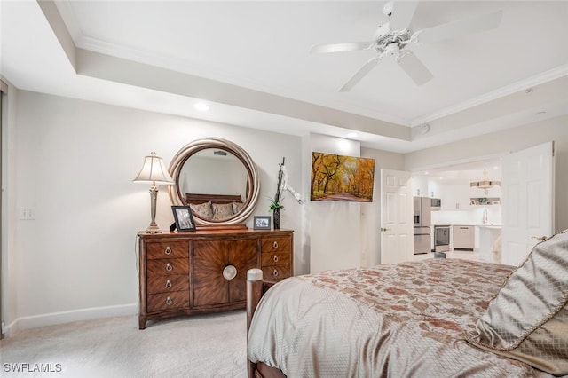 bedroom featuring light carpet, baseboards, a tray ceiling, and stainless steel refrigerator with ice dispenser