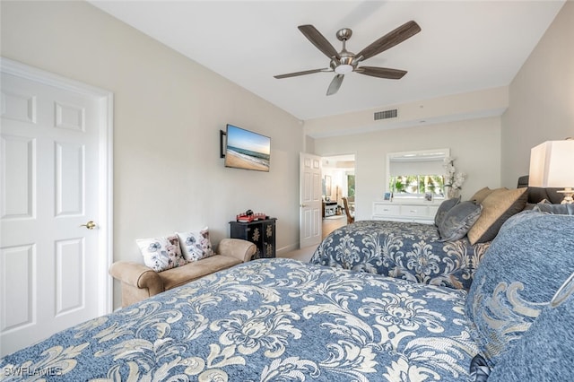 bedroom featuring visible vents and ceiling fan