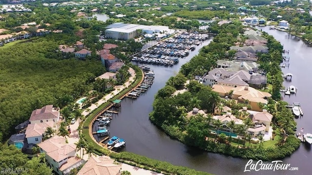 aerial view with a water view and a residential view