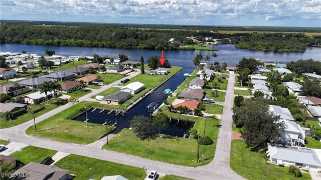 drone / aerial view with a water view