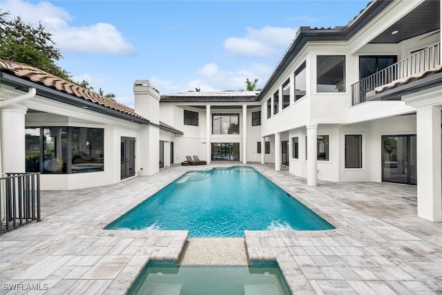 view of pool with a patio