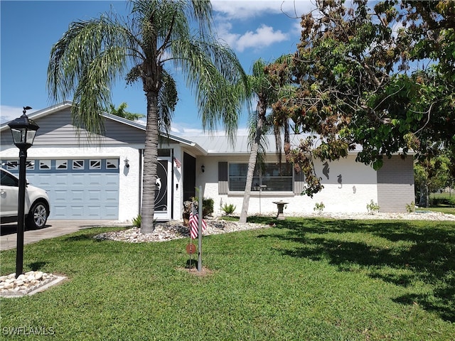 ranch-style house with a front yard and a garage