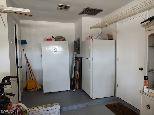 interior space with white fridge