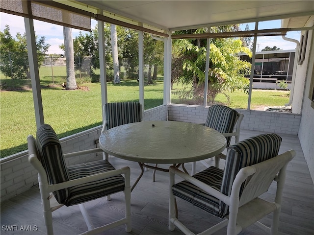 sunroom with plenty of natural light