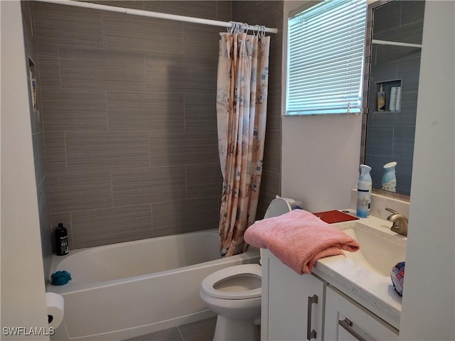 full bathroom featuring vanity, shower / tub combo with curtain, and toilet