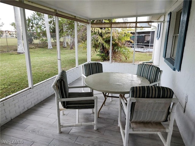 sunroom with plenty of natural light