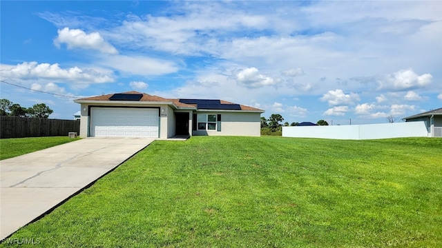 ranch-style home featuring solar panels and a front yard