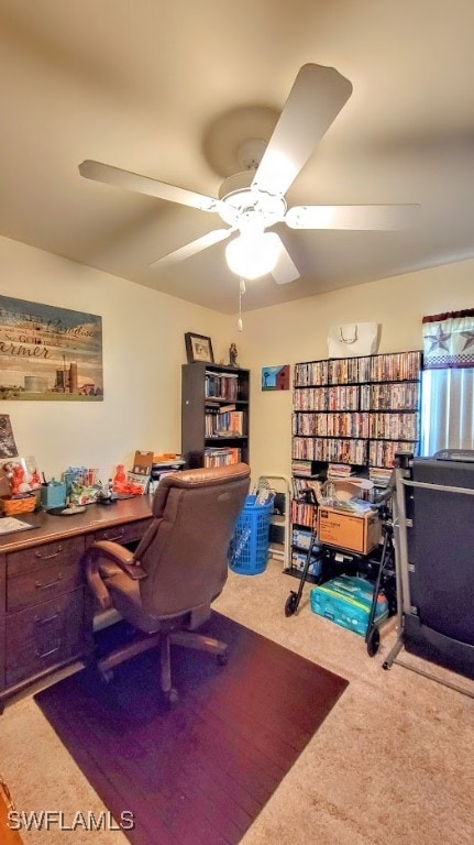 office space with carpet and ceiling fan