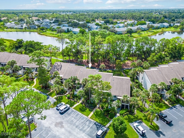 bird's eye view with a water view