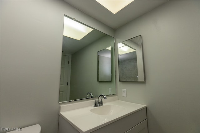 half bath with toilet and vanity