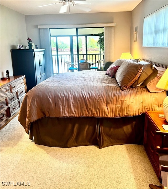 carpeted bedroom with ceiling fan and access to exterior