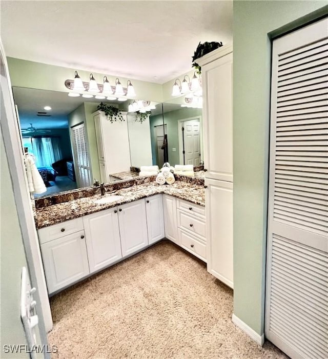 5925 Trailwinds Dr Unit 926, Fort Myers, FL 33907 - full bathroom featuring vanity, ensuite bathroom, carpet flooring, and baseboards