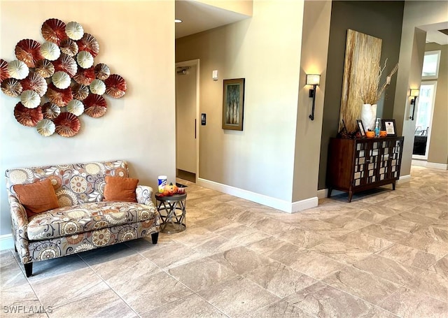 5925 Trailwinds Dr Unit 926, Fort Myers, FL 33907 - sitting room with baseboards