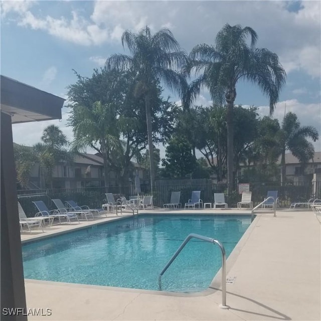 5925 Trailwinds Dr Unit 926, Fort Myers, FL 33907 - community pool with a patio