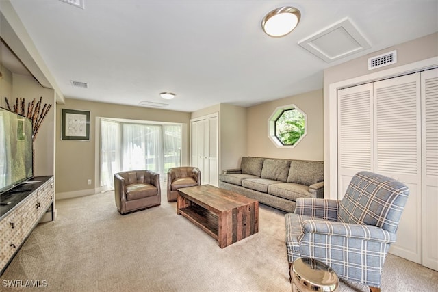 carpeted living room featuring a wealth of natural light