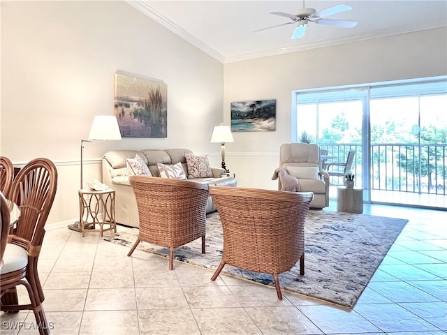 living room featuring ceiling fan, light tile patterned floors, and crown molding