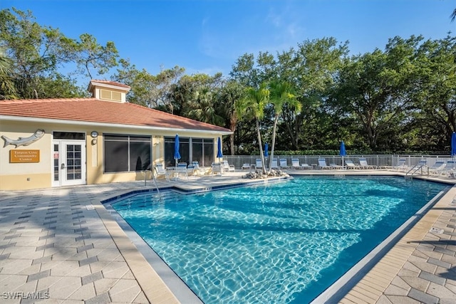 view of swimming pool featuring a patio area