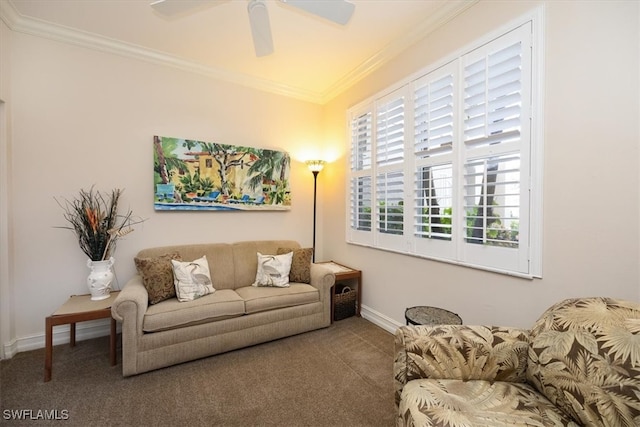 carpeted living room with ornamental molding and ceiling fan