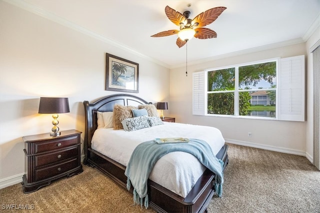 bedroom featuring ceiling fan, carpet floors, and crown molding