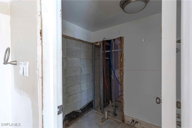 bathroom featuring concrete floors