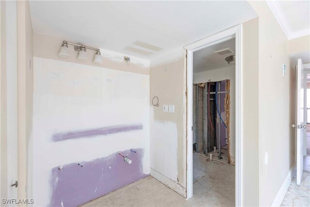 bathroom with ornamental molding