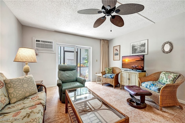 living room featuring a textured ceiling, light tile patterned floors, and ceiling fan