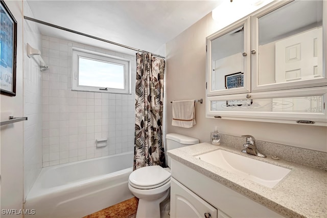 full bathroom with vanity, toilet, and shower / tub combo with curtain