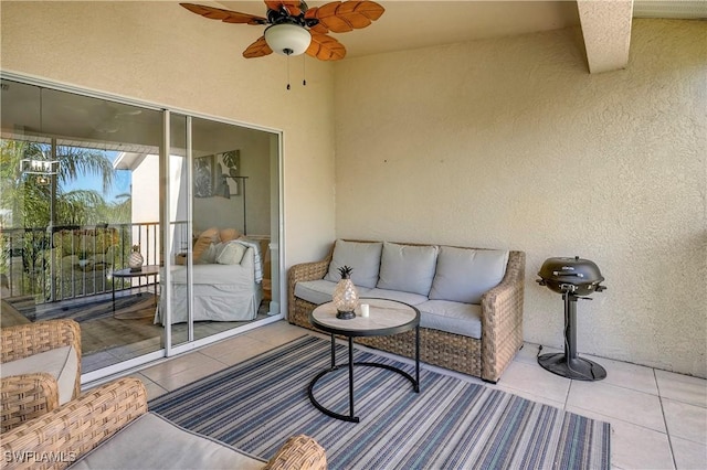 tiled living room featuring ceiling fan