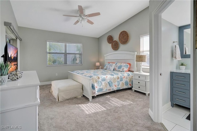 bedroom featuring ceiling fan and light colored carpet