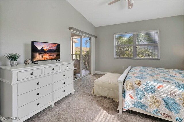 carpeted bedroom featuring lofted ceiling, access to exterior, and ceiling fan